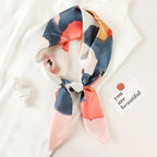 Silk checkered scarf with charm