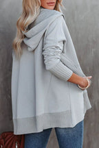 Women's longline oversized hoodie with press-stud neckline